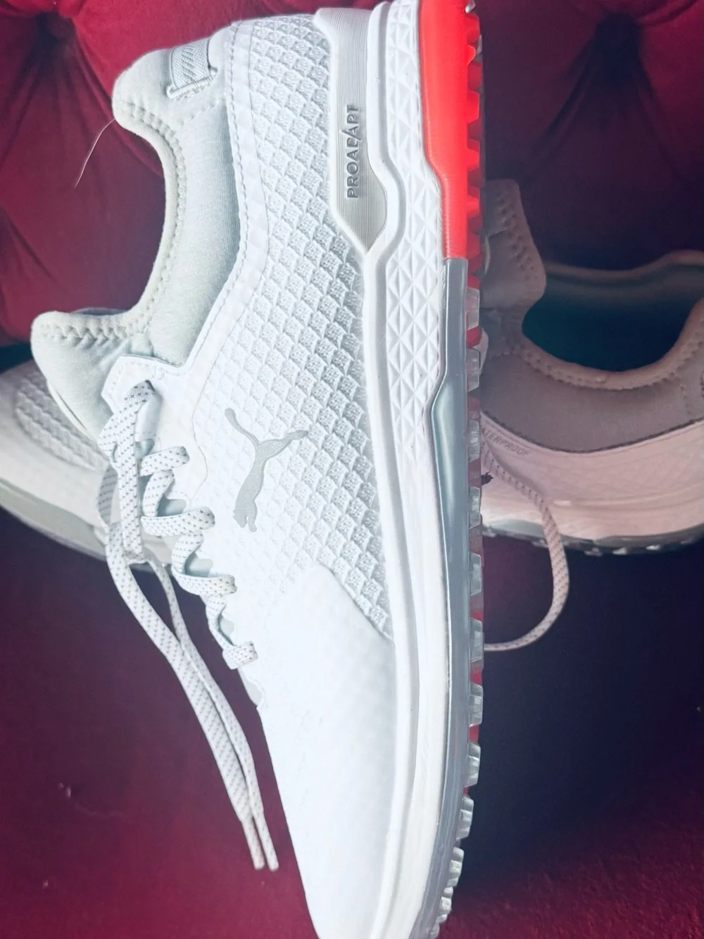 Puma White Trainers with Red Outsole Detail